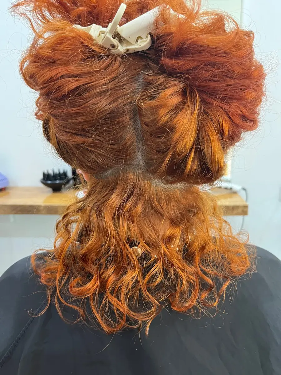 During: Styled with Curl Hero, dry cut in progress at The Curl Collective, Norwood